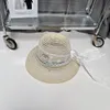 Cappello designer di lusso Elegante cappello da camicia di paglia in pizzo per la spiaggia per le vacanze di pescatori di pescatori di pescatori di pescatori da donna da sole