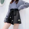 Shorts femminile femminile versione coreana di estate sottili casual sciolti per donne pantaloni a gamba larga che indossa sport all'esterno