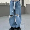 Jeans pour femmes épice fille brisée 2024 bleu usé des pantalons mendiants dessinés drapant lacet droit vers le haut