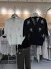 レディースニット韓国のファッション植物スパンコールvネックカーディガンセーター女性2024夏のシングル胸Tシャツブラックニットジンガー