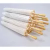 Parasols Paper Fãs Branco Casamento noivo Manunhante de madeira japonesa Artesanato chinês 60 cm de diâmetro guarda -chuvas fy5699 0509 s
