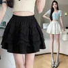 Летняя одежда кружевная юбка Черная белая мини -юбка Женщины Черные милые пушистые юбки корейская уличная одежда моды Y2K 240513