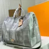 Sac en cuir authentique sac de luxe créateur de sac à main mensonges de mode en cuir totes bottes bacs épaule sacs de sacs de voyage tra Avhi