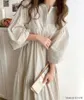 Sukienki imprezowe 2024 Wczesna wiosna japoński w stylu japoński Koreański kolor stały prosty luźna sukienka Lantern Sukiena dla kobiet