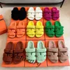 Slippers Sandálias de lã de lã de lã ovelha de lã de lã Moda feminina Sapatos peludos de inverno quente slides planos de camurça sherpa fleece clássico chinelos mulas