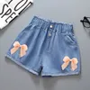 Kids Girls Summer Denim Shorts princesse mignon Button Jeans 2024 Arrivée Enfants décontractés Pantalons courts de taille haute coton 240508