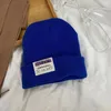 Berets Automne / hiver tricot chaud chapeau de couleur solide étiquette de marque couple couple de mode extérieur laine froide tout