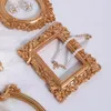 Bolsas de jóias exibem ornamentos de molduras de moldura de mina de ouro