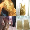 Club Women Party Dress Kendall Jenner Spaghetti Strap mantel draperade ihåliga ut Spark Diamonds Neck Halter 240508