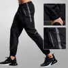 Spodnie męskie Szybkie suszenie Spodnie Spodnie Mężczyźni biegnący spodnie z kieszeniem na zamek błyskawiczne trening joggings sporty spodni fitness swobodny dres y240513
