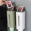 Bottiglie di stoccaggio di carta usa e getta distributore di carta di plastica montata a parete.