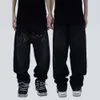 Trendiga och knubbiga överdimensionerade casual hiphop skateboardbyxor med fet kille lösa denim fett lårbyxor, mäns knubbiga jeans