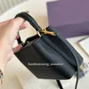 Luxurys Handbag Shop Designers The Tote Bag Woman Mens On the Go Clutch Mother Bage Black Disaper Shoulder Bag Cowhide Leather Purse Wallet Crossbody Travelbod