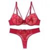 Reggiseni set nouvelle senza cucitura da donna sexy reggiseno usato per spingere il reggiseno fiore in pizzo abito da sera imbottito di filo top top dimensione Y240513