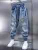 Jeans maschere alla moda hip-hop street blu patchwork Pantaloni harem a pieghe di abbigliamento alla moda
