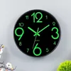 壁時計は、実用的な蛍光効果と家の装飾の正確な割合を持つ明るい壁時計の新しいタイプの明るい壁時計時計