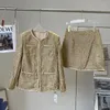 Рабочие платья дизайнеры брендов осень зимняя одежда женщин 2024 Роскошная винтажная золотая твидовая куртка мини -юбки Два куска наряда