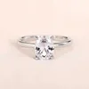 Wedding Rings Huitan Elegant Oval Cubic Zirconia Ring Geschikt voor vrouwen Simple Classic Design Engagement Accessories Hot Jewelry Q240511