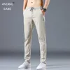 Pantalon masculin pantalon de soie de glace d'été Nouveau pantalon décontracté.