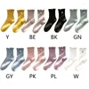 Chaussettes de femmes Japonais Girls Floral Broderies Coun Colon Couettes Coupled Vertical Striped Casual