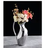 Vasi Nordic Vase Ornamenti di fiori secchi secchi creativi Modello in ceramica argento DECORAZIONE DECORAZIONE DECORAZIONE