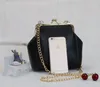 MJ Fashion Women Handbag Kiss Lock Pu Leather Chain Crossbody Body Sac à bandoulière Vintage Petit Sac à clips Female Sac Phone Sac 240513