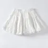 Jupes élastique taille blanche noire lolita plissée volant mini femmes occasionnelles jupe courte couture coréenne douce fille couche