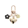 Diseñador Keychains para mujeres Cadena de llaves Billetera Corazón Luxury Camellia sinensis Accesorios de llaves Marcas de pulsera 2 Color