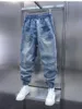 Jeans maschere alla moda hip-hop street blu patchwork Pantaloni harem a pieghe di abbigliamento alla moda