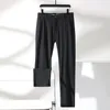 Calça masculina Botão de outono da primavera Solid High Wistide Bolsões zíper de terno casual calça Inglaterra Férias de férias Preppy