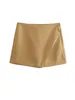 Shorts femminile Donne modella gonne asimmetriche con tasche a vita alta con cerniera con cerniera vintage Solido