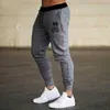 Pantalon masculin 2024 pantalon de survêtement mince des femmes Femme Fitness Workout Papant de survêtement Jogging Running Sweatpant Papant et automne Casual confortable Y240513