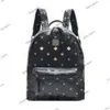 MCM1688 Backapck Leather Handbags en gros de grandes taille, les hommes et les femmes voyagent célèbres Rivet Printing Backpack Designer Lady Sacs Boy Girl School Bag 733