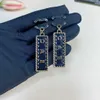 Boucles d'oreilles de créateur Denim Blue Square Studs