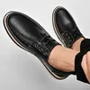 Chaussures décontractées en cuir noire rond baskets plates pour homme en lacet couleurs solides