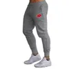 Men's Pants New popular spring and autumn thin style leggings for mens trousers sporty and slimming breathable printed cropped pants Y240513