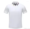 Men's Polos Mens Designer T-shirts Camisa Carta de impressão Top top pólo solto Homens tees causal para roupas masculinas Tampas asiáticas