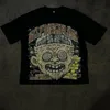 Y2K Street Hip Hop Big Head Grimace Graphic Imprimé Extra Large Mens Retro Gothic Fashion décontractée Cound Fotting Round Botting 240509