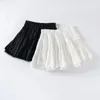 Röcke elastische Taille weiß schwarze Lolita Falten Rüschen Mini Frauen lässig Kurzrock Cutecore Koreanisch süßes Mädchen geschichtet