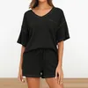 Texte de survêtement pour femmes Texture Waffle Texture T-shirt Femme Shorts Réglage des manches courtes V Couper Vêtements sportifs en vrac respirant