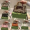 Kosmetisk väska dubbla bokstäver solid hasp midja fyrkantiga ränder kvinnor lyxhandväskor kvinnor messenger väskor runt en multi funcito handväskor fgvh