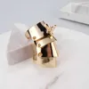 Designer Westwoods ist eine beliebte Internet -Berühmtheit mit gleichen coolen und gutaussehenden Mädchen Single Item Vier Sektion Ring Armor Gold Silber Titanium Black Nagel