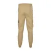 Pantalons de travail pour hommes Pantalons à la mode printemps à la mode et style ajusté décontracté et lâche avec de grandes poches pantalons harem 240513