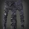 Pantalones para hombres yasuguoji nuevo 2023 pantalones de cuero para put al aire libre marca de calavera de moda marcador parche trabajo para hombres ajustes de cuero de motocicleta jeanssl2405