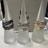 Designer Westwoods Ring dubbelskikt bältesspänne med diamantkvinna som omger låsdesignhandstycke nagel