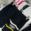 Projektanci męskie spodnie Wysokiej jakości szerokie legalne spodnie Letter Drukuj D04