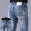 Mäns jeansdesigner 2024 Spring och Autumn New Elastic Straight Leg Pants Big Brand Long Trendy Youth Casual Iz0Z