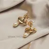 Conception de boucles d'oreilles Planet Perl Pendant Saturn Pearl Stud Light Style Luxury Boucles d'oreilles Love With Original Jewel Box 2024 New Fashion