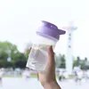 300 ml plastikowej wytrząsarki butelki z wodą Dzieci Przenośne sporty na świeżym powietrzu kubki na mleko z pokrywką wielokolorami przezroczysty kubek różowy zielony fioletowe kolory 2 85Bz