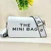 Mode de créateur le mini sac en cuir crossbody sac le cuir mini sac d'épauvage pour femmes mini-noir classique Nouvelle sacs à provisions de rue populaires de haute qualité